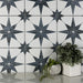 SomerTile - Cassis Stella 10" x 10" Porcelain Tile - Black wall installation