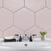 SomerTile - Textile Basic 9" x 10" Porcelain Hex Tile - Rose wall installation