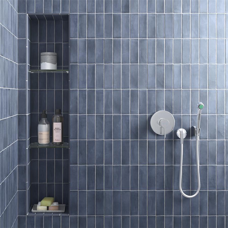 SomerTile - Coco 2 in. x 6 in. Matte Porcelain Tile - Blue Night wall installation