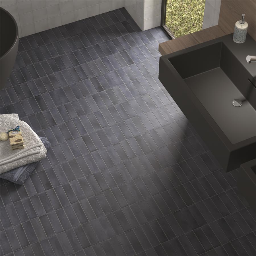 SomerTile - Coco 2 in. x 6 in. Matte Porcelain Tile - Blue Night floor installation