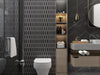 DW Tile & Stone - Aura - Nero Marquina Marble Picket with Brass Polished Mosaic Installed
