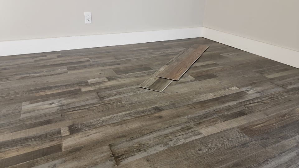 Resolve - 5.0 Series - 7" x 48" Rigid Core SPC - Bear floor installation