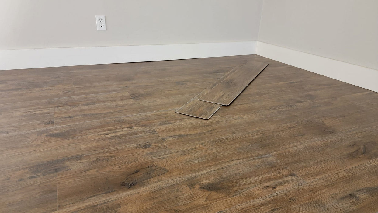 Resolve - 5.0 Series - 7" x 48" Rigid Core SPC - Whiskey Barrel floor installation