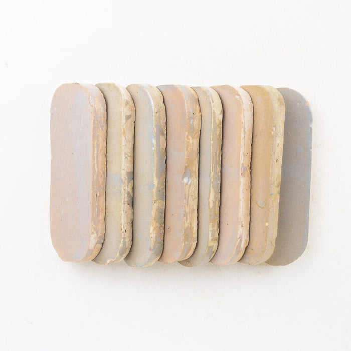 Lungarno - Zellige Bespoke - 2 " x 6" Ovals Glossy Terracotta Tile - Twilight Bloom Stacked