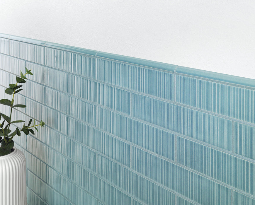 Tesoro - Vibrant Series .5" x 9" Porcelain Quarter Round Tile Trim - Aqua wall installation