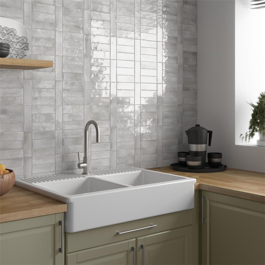 SomerTile - Coco 2 in. x 6 in. Glossy Porcelain Tile - Amber Grey wall installation