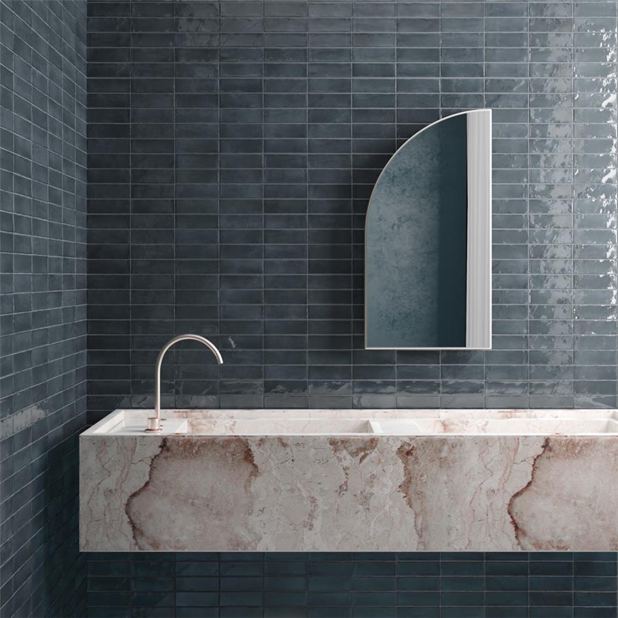 SomerTile - Coco 2 in. x 6 in. Glossy Porcelain Tile - Blue Night wall installation