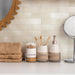 SomerTile - Coco 2 in. x 6 in. Glossy Porcelain Tile - Canvas Beige wall installation