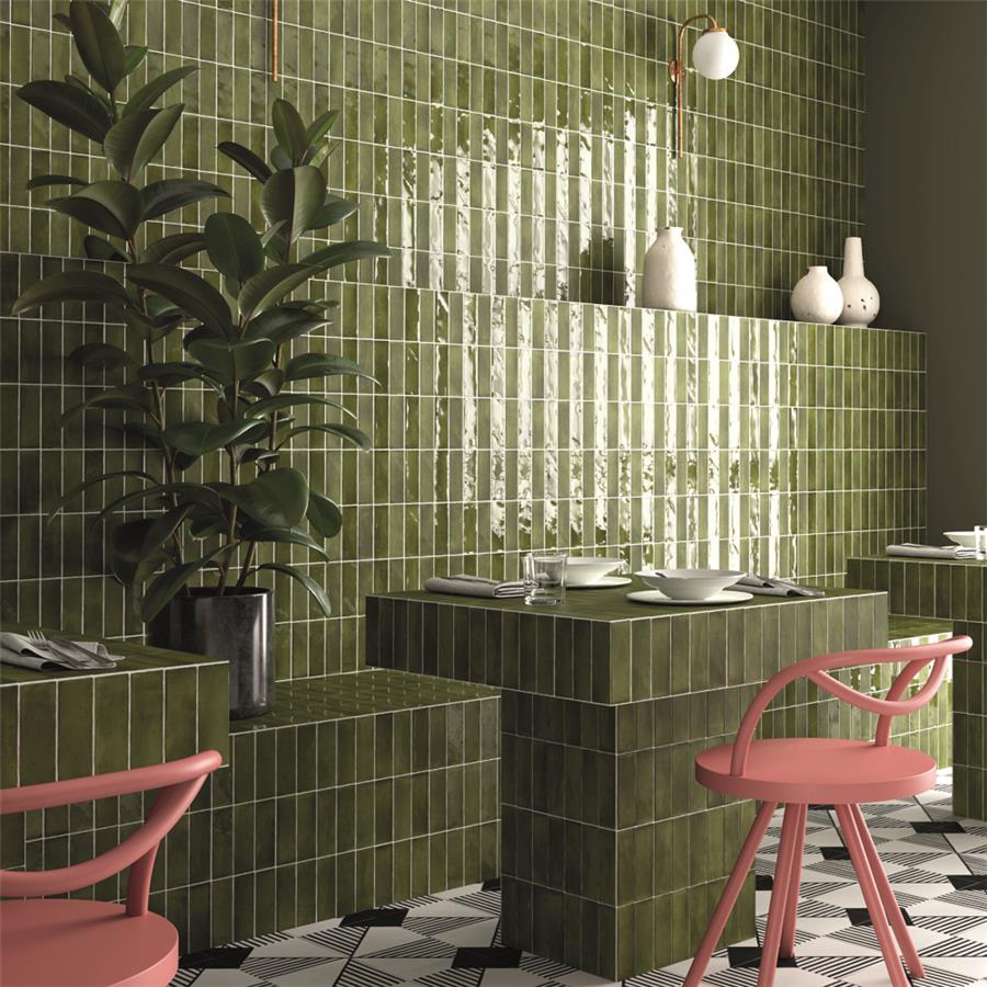 SomerTile - Coco 2 in. x 6 in. Glossy Porcelain Tile - Moss Verde wall installation