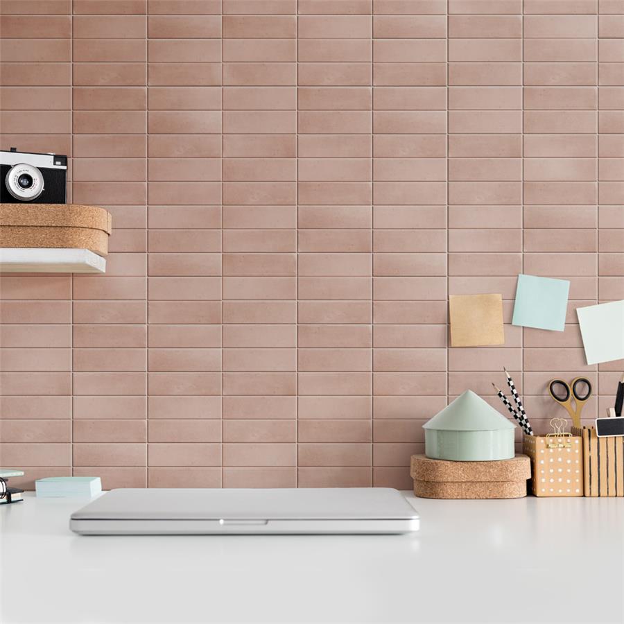 SomerTile - Coco 2 in. x 6 in. Glossy Porcelain Tile - Orchard Pink wall installation