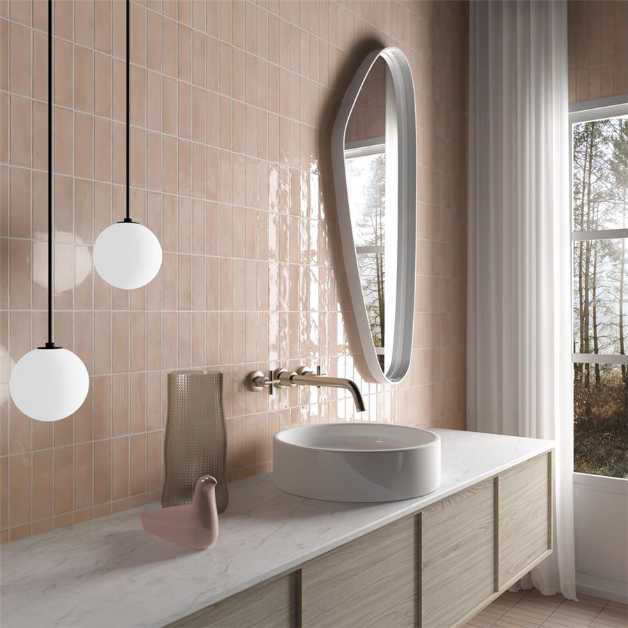 SomerTile - Coco 2 in. x 6 in. Glossy Porcelain Tile - Orchard Pink wall installation