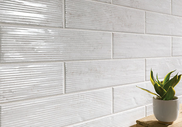 Bellagio - Groove Collection - 3" x 12" Porcelain Tile - Rhythm Ice wall installation
