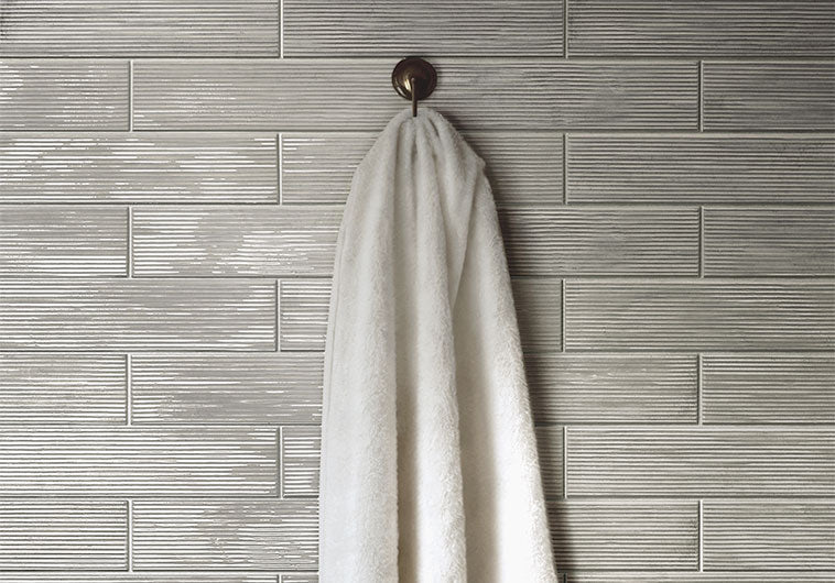 Bellagio - Groove Collection - 3" x 12" Porcelain Tile - Jam Grey wall installation