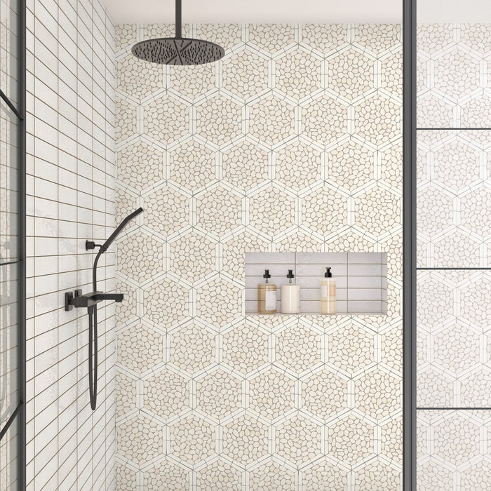 Daltile - Pebble Oasis Natural Stone Mosaic - Framed Hex - Icicle shower wall installation