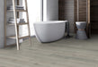 FirmFit - Intown Collection - 9 in. x 60 in. Luxury Vinyl Plank - Metropolitan Room Scene