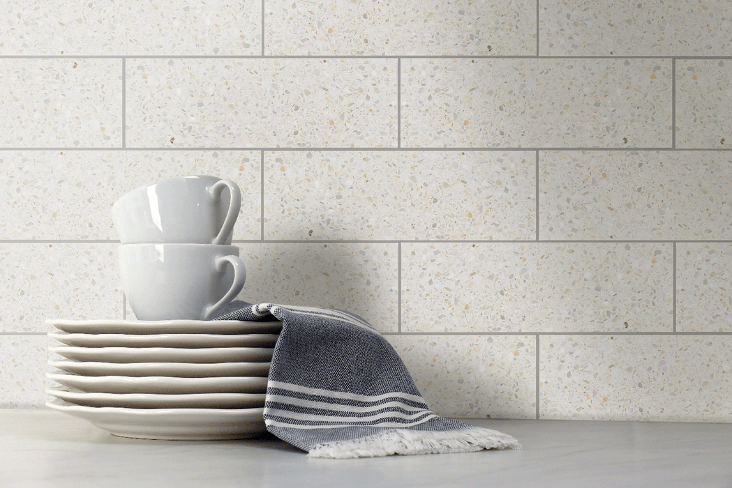 Tesoro - Venice Collection - 3 in. x 9 in. Stone Tile - Sand Terrazzo Installed
