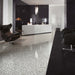 Arizona Tile - Terrazzo 24" x 24" Porcelain Tile - Black Room Scene