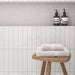 Bedrosians Tile & Stone - Clara 2.75" x 11" Matte Porcelain Tile - White Installed