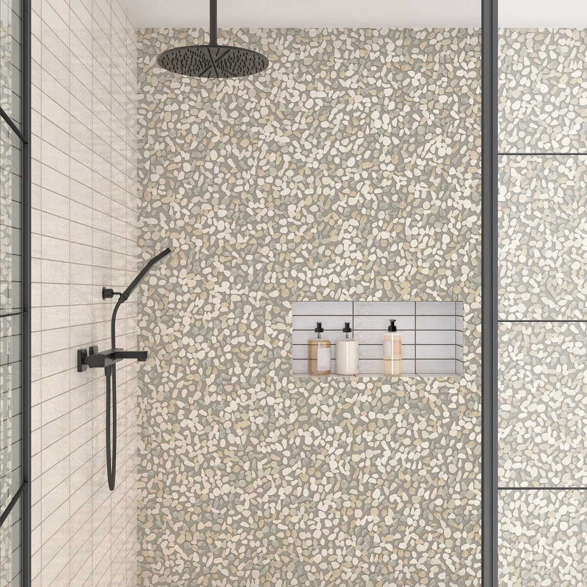 Daltile - Pebble Oasis Natural Stone Mosaic - Flat Pebble - Seashell shower installation